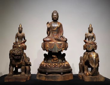 A group of Tang Dynasty bluestone gilt painted statues of the Three Holy Buddhas