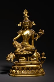 A bronze gilt ornament in the Guanyin study