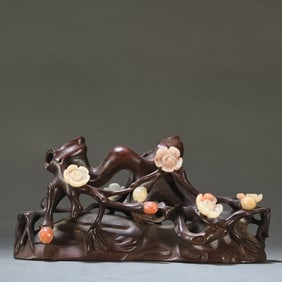 A piece of Qing Dynasty red sandalwood inlaid hibiscus stone carved plum blossom ornament