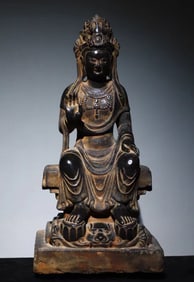 A Northern Qi bluestone carved Guanyin seated statue