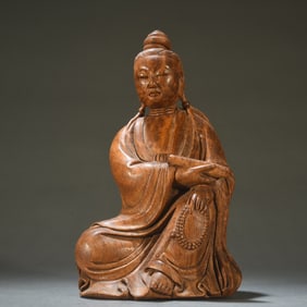 A Huanghuali scroll Guanyin ornament