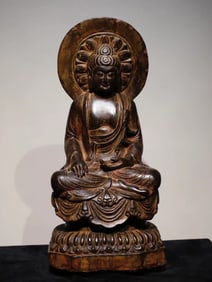 A piece of bluestone painted Buddha statue from the Tang Dynasty