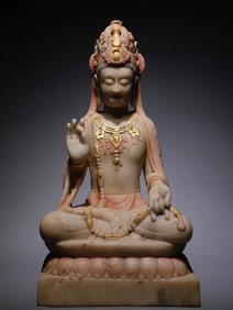 A Northern Qi white marble painted Guanyin seated statue