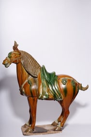 A Tang Dynasty three-color horse ornament