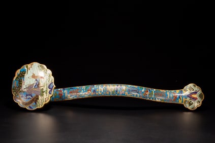 A piece of cloisonné Ruyi