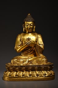 A piece of bronze gilt Shakyamuni Buddha
