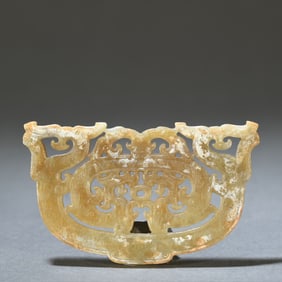 A carving of an ancient jade dragon