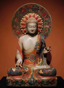 A Tang Dynasty white marble painted Buddha statue