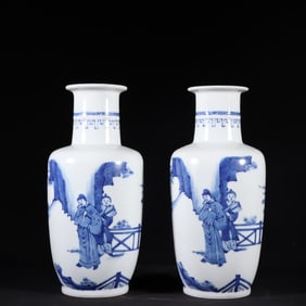 A pair of Ming Dynasty Chongzhen blue and white figures stick bottles