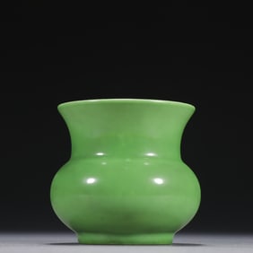 A piece of clear apple green glazed slag bucket