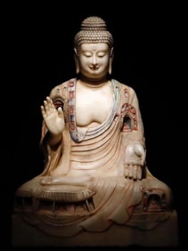 A Tang Dynasty white marble grotto statue