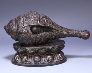 A late Qing Dynasty old agarwood dark eight immortal beast pattern conch ornaments