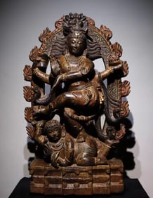 A bluestone carved painted Guanyin seated statue