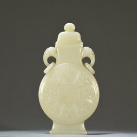 A piece of Hetian jade carved eight treasure pattern cap bottle