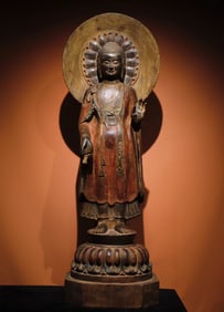 A Northern Qi bluestone painted Buddha statue