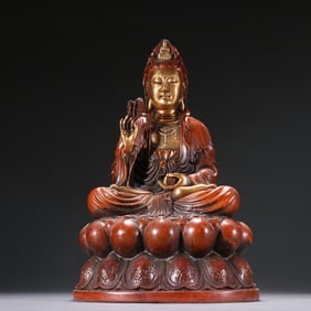 A bronze gilt seated statue of Guanyin