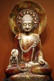 A Tang Dynasty white marble painted Buddha statue