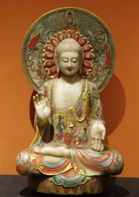 A Northern Qi white marble painted Buddha statue