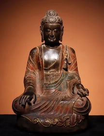A piece of bluestone painted Buddha statue from the Tang Dynasty