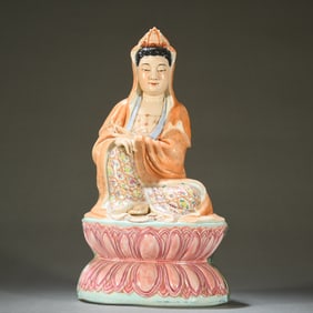 A pastel porcelain statue of Guanyin