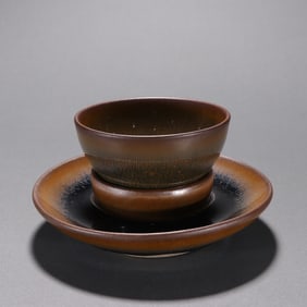 A piece of kiln rabbit glazed cup