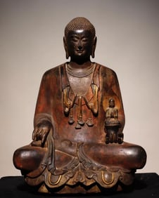 A Northern Qi bluestone painted Buddha statue