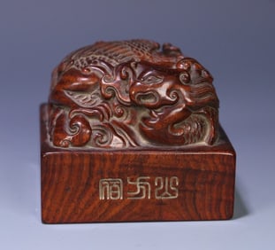 A piece of Huanghuali phoenix button stamp