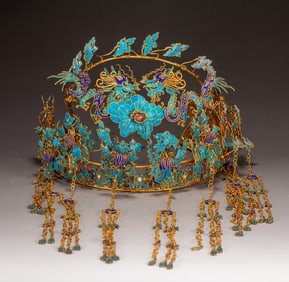 A silver-gilt dotted emerald phoenix crown
