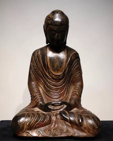 A Northern Qi bluestone painted Buddha statue