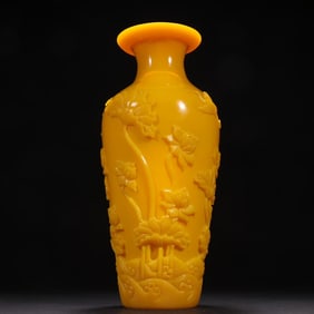 A chanterelle yellow tire carving "a product of incorruptible" bottle