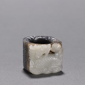 A piece of Qing blue and white seed material skillfully carved "unicorn send book pattern" horseshoe