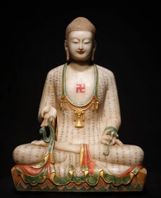 A Northern Qi white marble painted Buddha statue