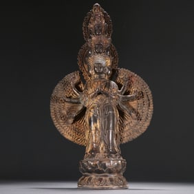 A Ming bronze gilt statue of a thousand-armed Guanyin
