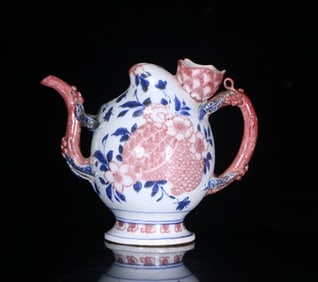 A piece of blue and white glazed red kettle