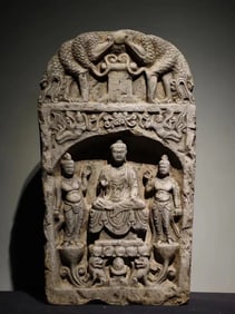 A Tang Dynasty bluestone carved Buddha stele