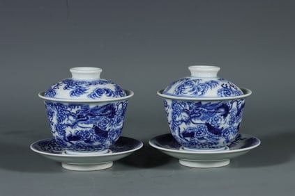 A Pair of Blue and White Dragon Pattern Bowls and Covers