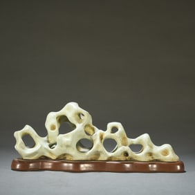 A piece of Brother kiln imitation Taihu Lake stone pen holder