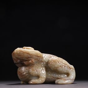 A Qing Dynasty Hetian jade seed material gold toad ornament