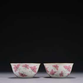 A pair of Qing Yongzheng pastel butterfly pattern tea rounds