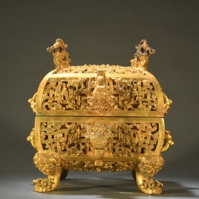 A copper-gilt square food box