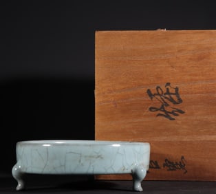 A piece of Song Dynasty official kiln blue glaze three-legged furnace