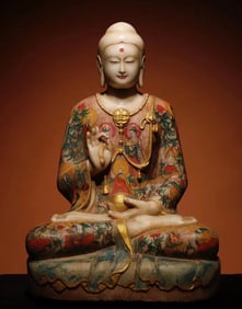 A Northern Qi white marble painted Buddha statue