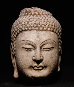 A Tang Dynasty bluestone Buddha head ornament