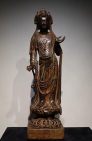 A Tang Dynasty bluestone painted Guanyin standing statue