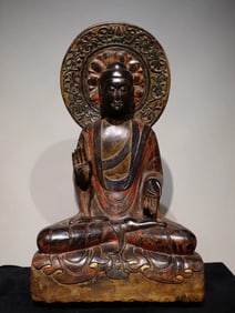 A Northern Qi bluestone painted Buddha seated statue