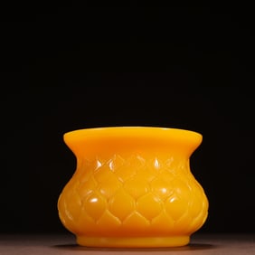 A piece of clear chanterelle yellow material tire lotus pattern slag bucket