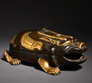 A bronze gilt new beast incense burner study ornament
