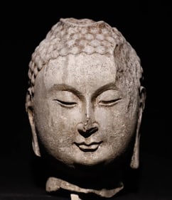 A Northern Qi bluestone Buddha head ornament