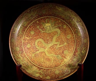 A large plate with red dragon pattern on the yellow of Jiajing of the Ming Dynasty