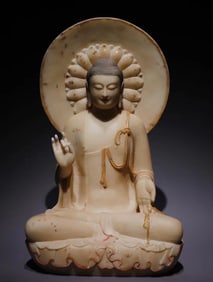 A Northern Qi white marble painted Buddha statue